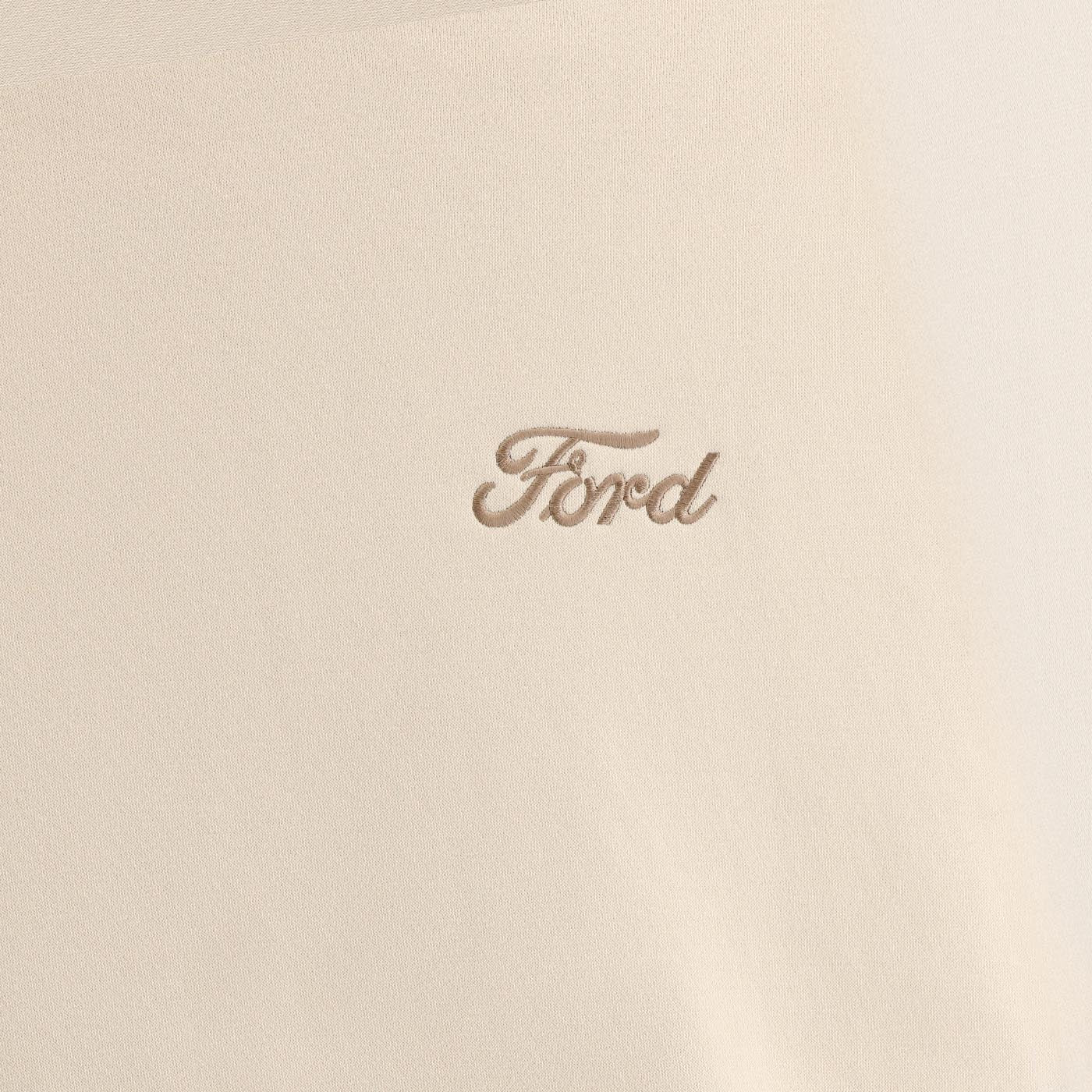 Ford logo embroidered on a beige fabric background