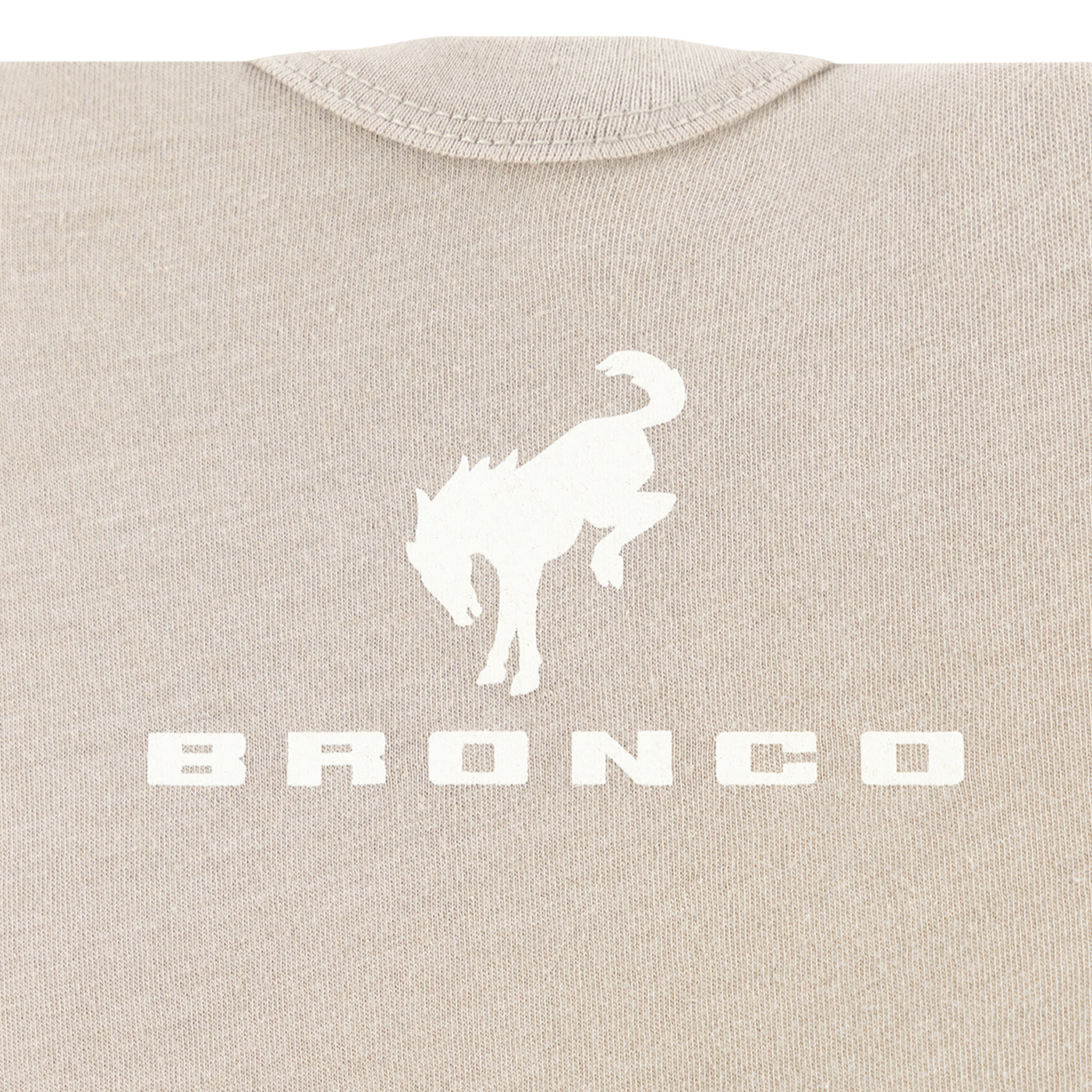 Beige shirt with white 'Bronco' logo and horse silhouette