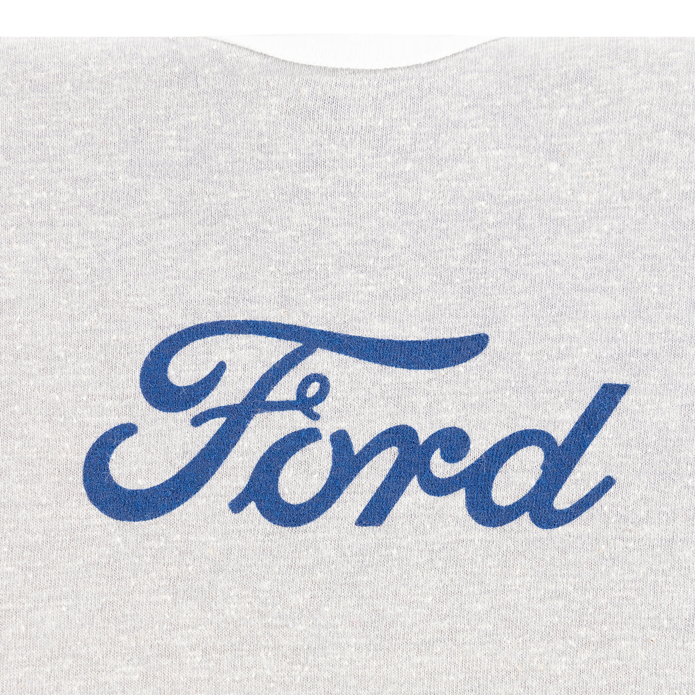 Blue Ford logo on a textured white background