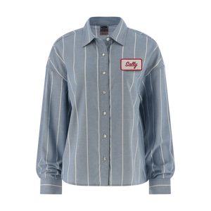 Blue striped shirt with a red label on a white background