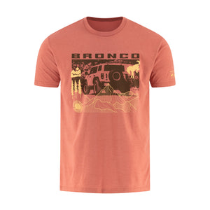 Peach-colored t-shirt with Bronco graphic on a white background