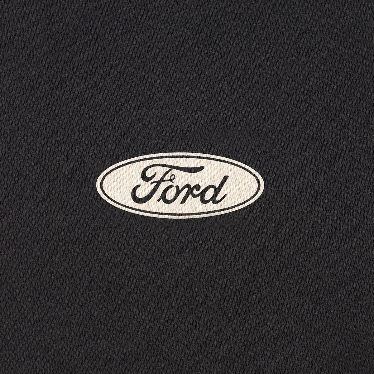 white Ford oval logo on a black background