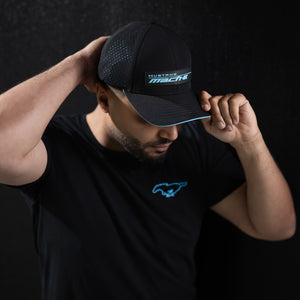 man wearing a Mustang mach-e hat and t-shirt on a black background