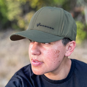 man outdoors wearing Ford Bronco Off-Set Logo Stretch Fit Hat