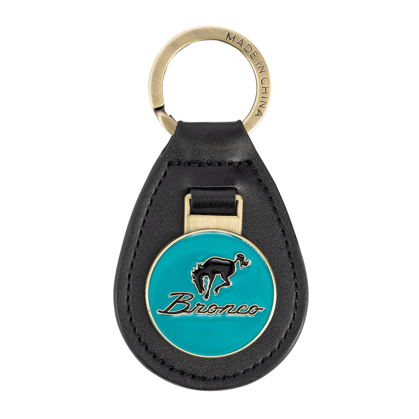 A Ford Bronco vintage keychain with a black leather backing, antique brass keychain medallion with a teal enamel pop of color featuring the Bronco logo.