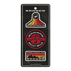 A set of three Ford Bronco patches with varying designs, mounted on a display card. The patches feature the Bronco logo and the phrases 'Built Wild' and 'Free Wheeling'.