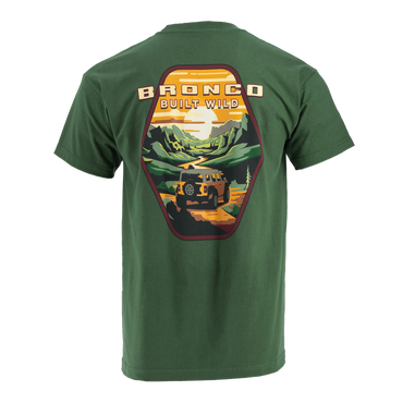 A green short-sleeved T-shirt with a graphic print on the back showing a vintage design with a Ford Bronco vehicle in a outdoor setting.