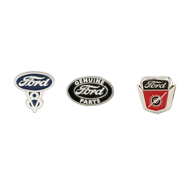 Three Ford logo pins on a white background