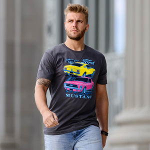 Man wearing a t-shirt with Ford Mustang graphics in an urban setting