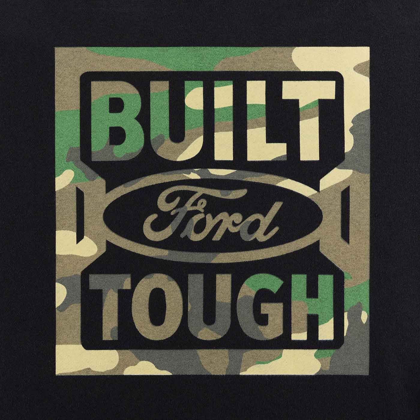 close up of green camouflage built ford tough logo on black background