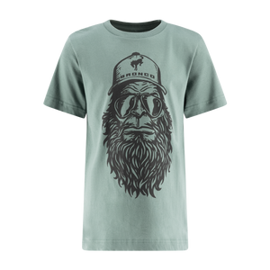 Light green t-shirt with graphic design of a bearded face wearing goggles and a cap on a white background.
