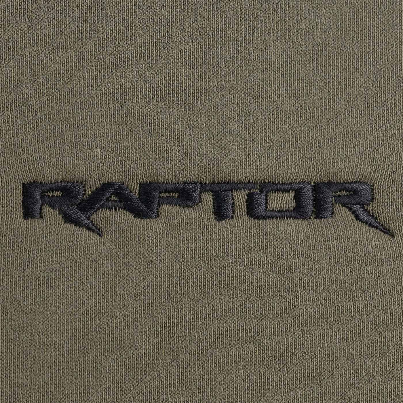 close up ford ford raptor logo on a green background