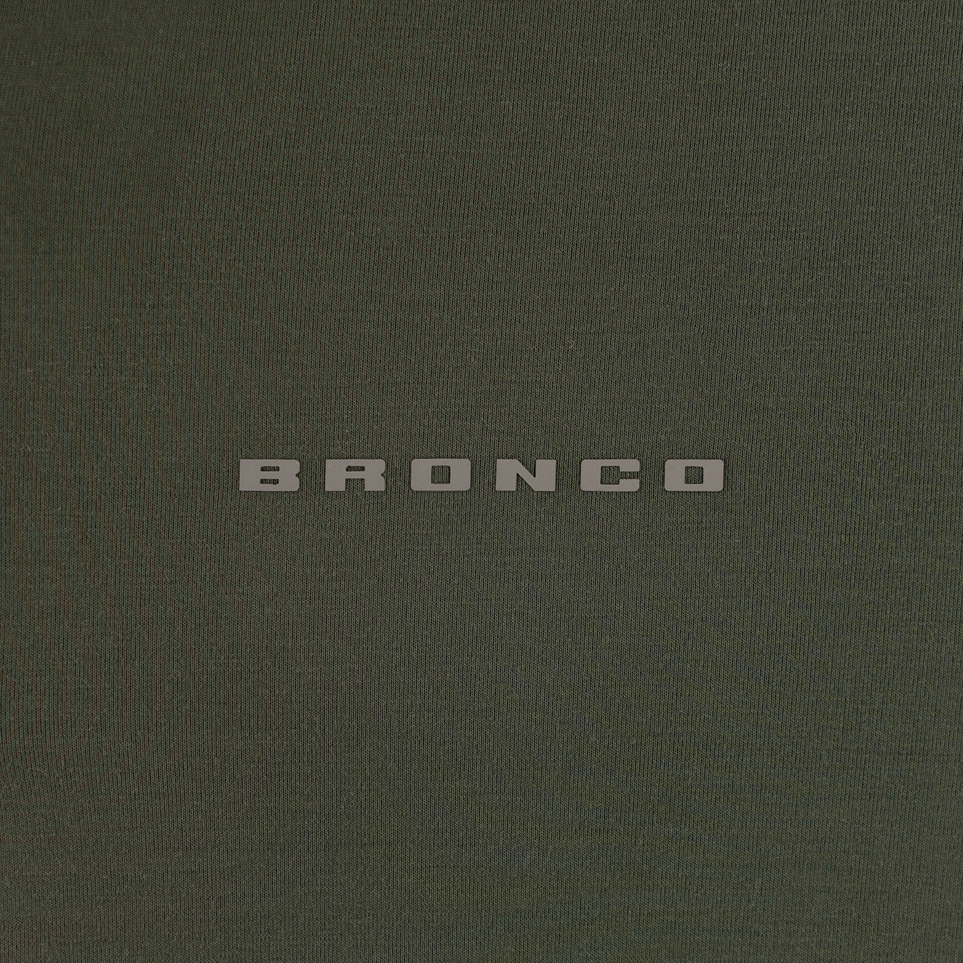 Dark green shirt with 'Bronco' logo on a dark green background