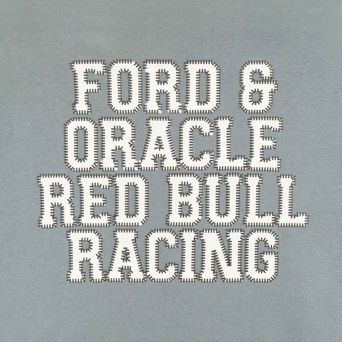Text 'FORD & ORACLE RED BULL RACING' on a gray background