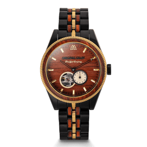 Luxury watch with wooden face and black and gold band on a black background