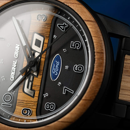 Close-up of a watch with wooden face and Ford logo