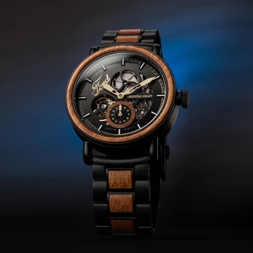 Luxury watch with black and wood accents on a dark background