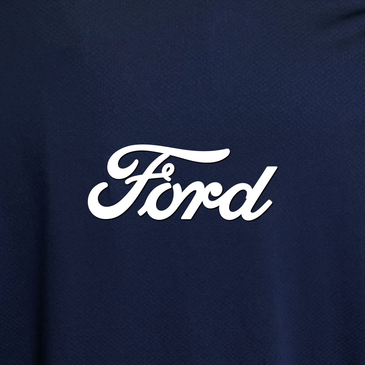 close up of white ford script on a navy blue background