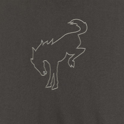 Outline of a bucking bronco on a dark gray background