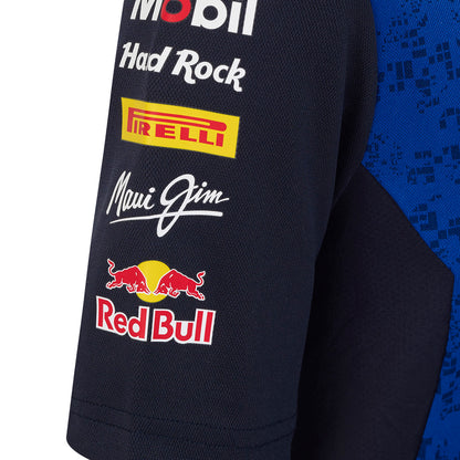 Close-up of a black fabric with various brand logos including Red Bull, Pirelli, and Maui Jim.