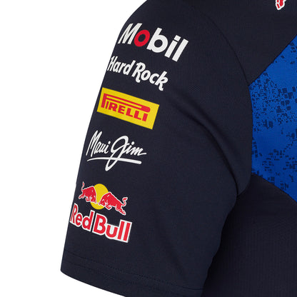 Close-up of a black sleeve with various brand logos including Mobil, Hard Rock, Pirelli, Maui Jim, and Red Bull.
