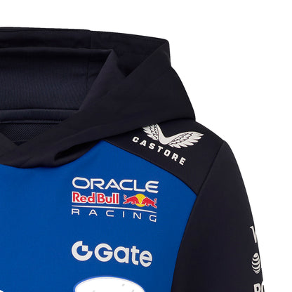 Close-up of a blue and black hoodie with Oracle Red Bull Racing and Castore branding.