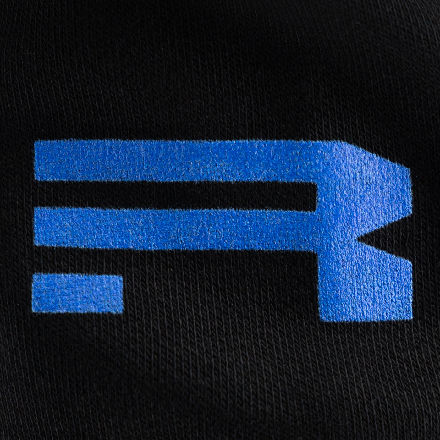 Blue Ford Racing logo on a black background