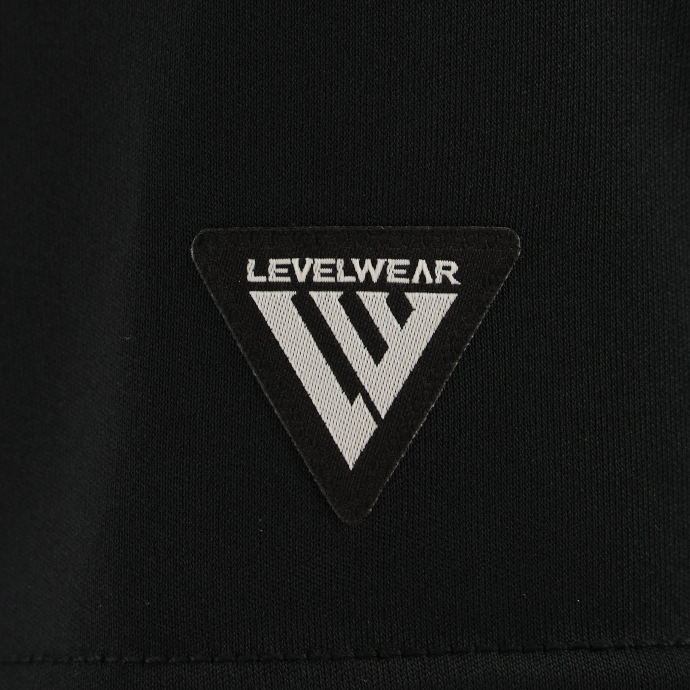close up of level wear logo on black background