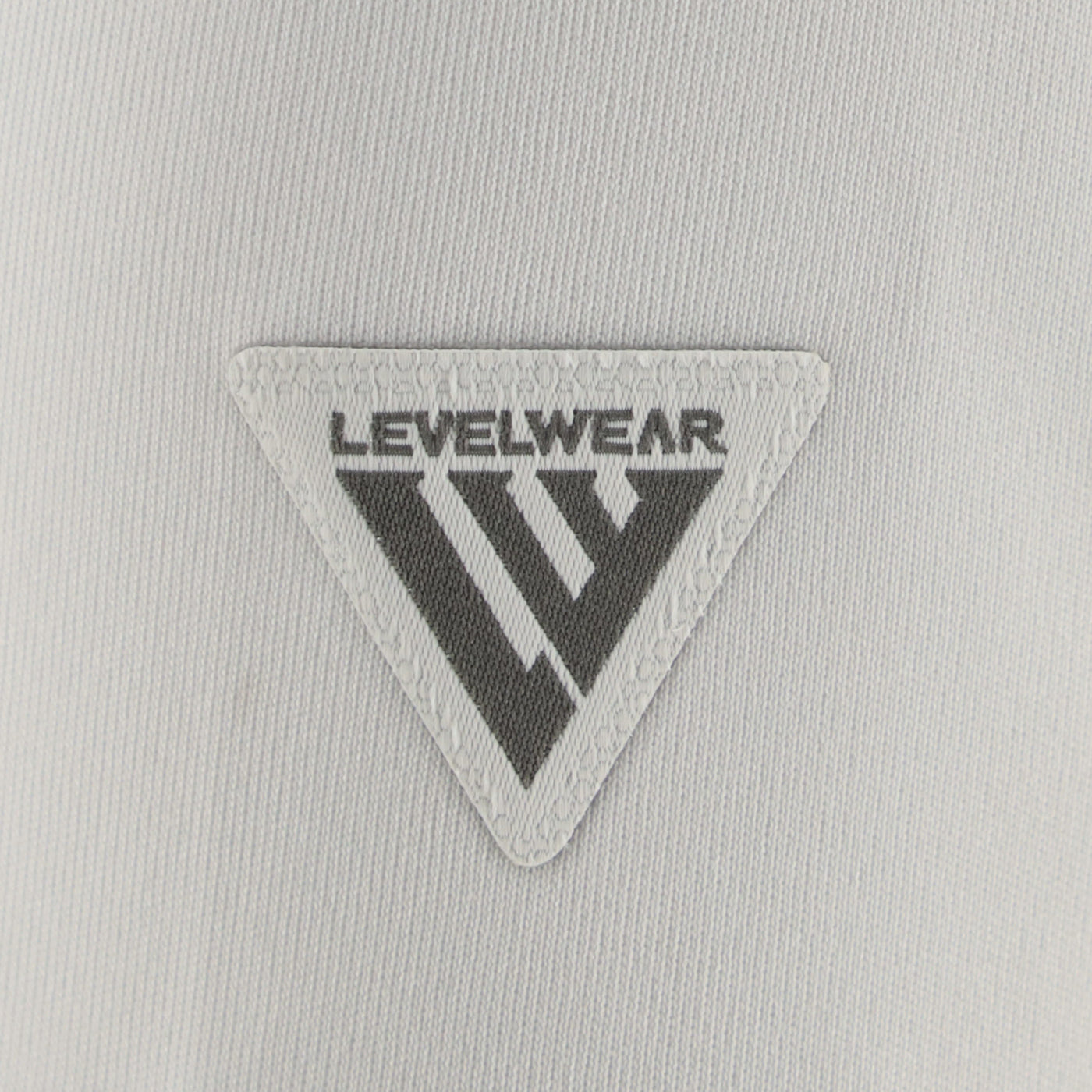 close up of level wear logo on white background