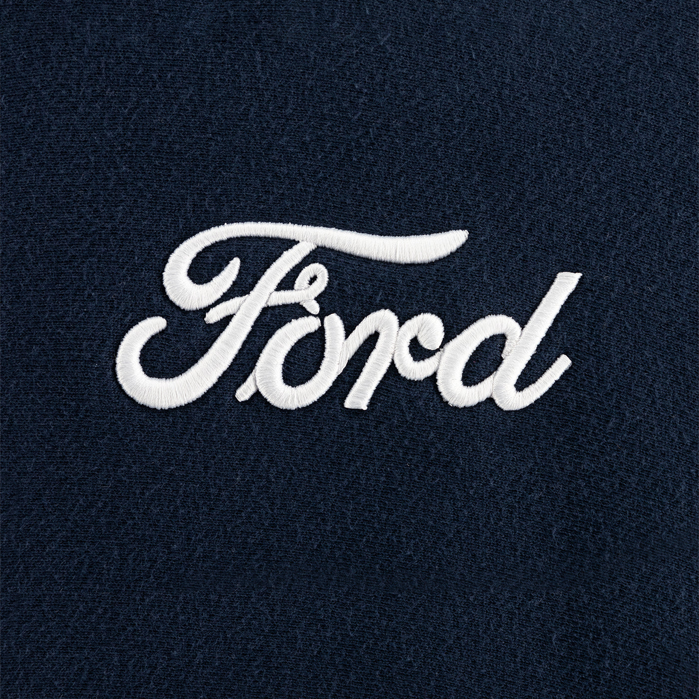 white ford script on a navy blue background