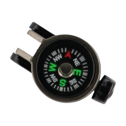 Compass with black casing and green and white markings on a white background