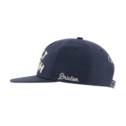 Navy blue cap with 'Brixton' logo on a white background