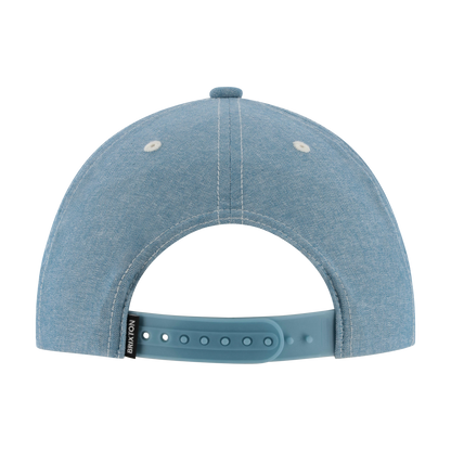 Blue denim cap with a visible brand logo on a white background