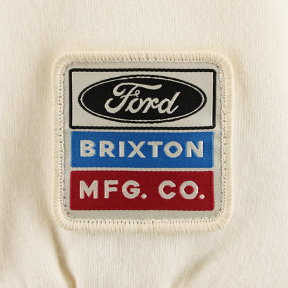 Patch with Ford, Brixton, and MFG. CO. logos on a beige background