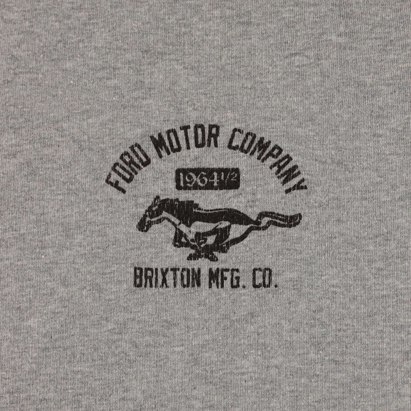 Gray fabric with black embroidered logo featuring a horse and text.