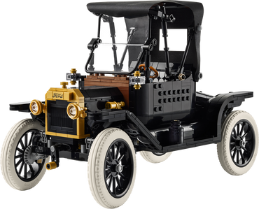 Model of an old-fashioned car made from interlocking bricks on a white background