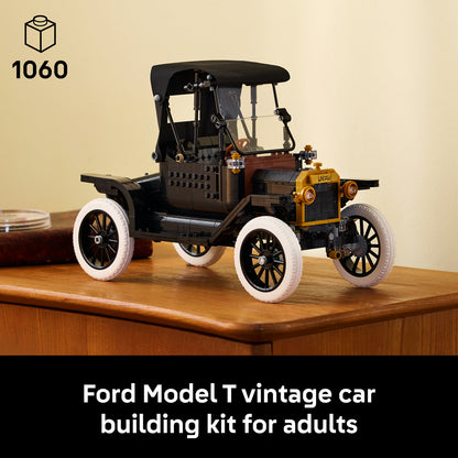 Model of a vintage Ford Model T car on a wooden surface with a beige background