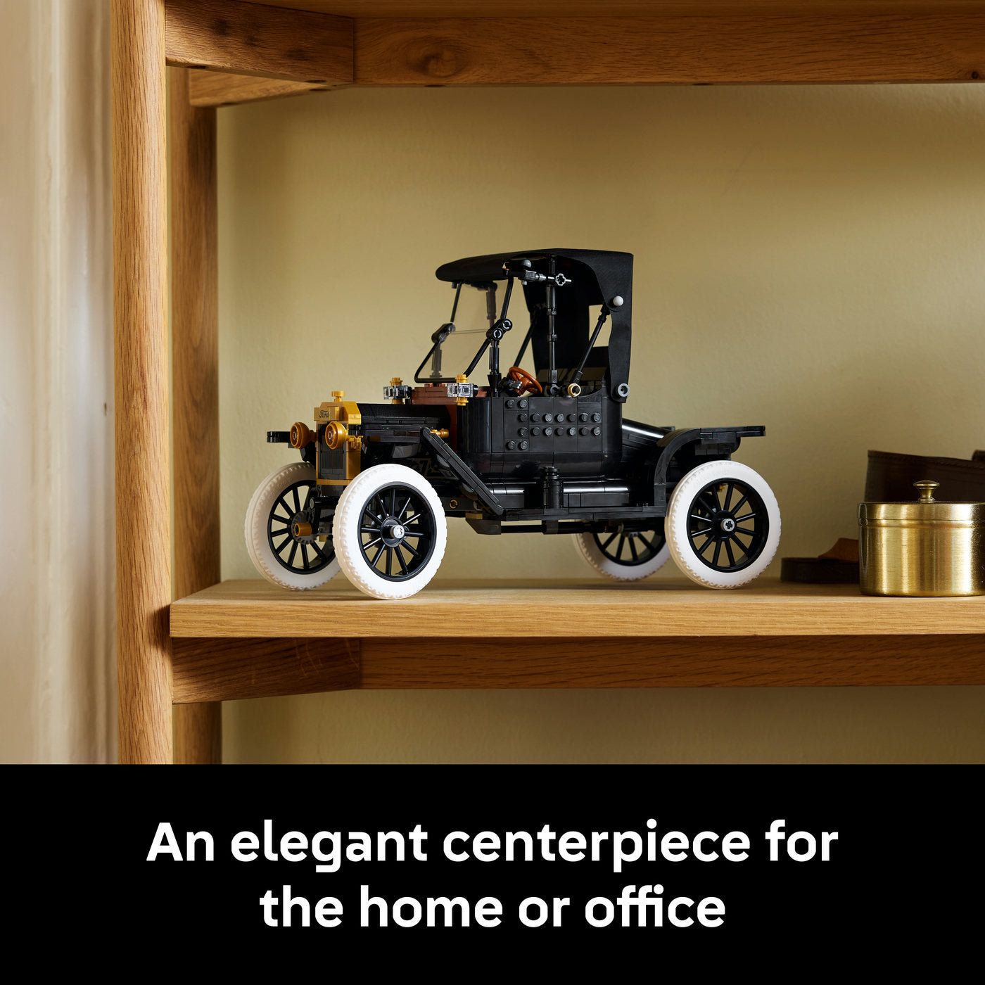 Vintage car model on a wooden shelf with text 'An elegant centerpiece for the home or office'.