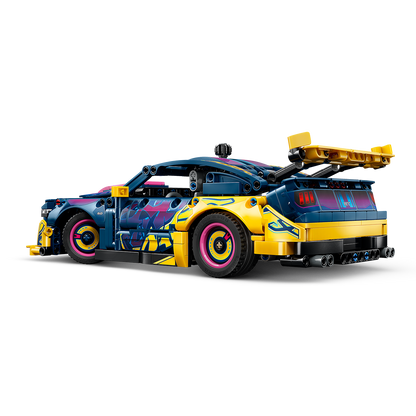 Colorful toy car with a blue and yellow design on a white background