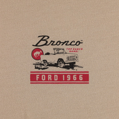 Vintage Ford Bronco logo on beige fabric background