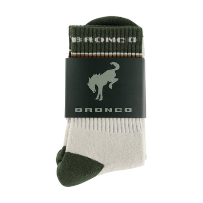 Green and white sock with 'Bronco' branding on a white background