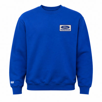A royal blue crewneck sweatshirt featuring a white and blue Ford Racing logo patch on the left chest, displayed against a solid white background.