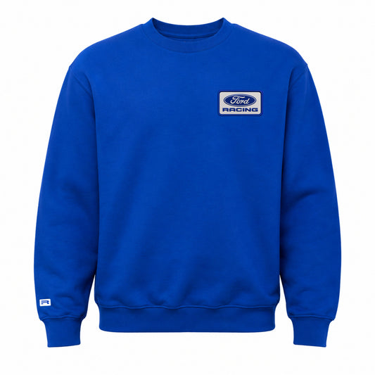 A royal blue crewneck sweatshirt featuring a white and blue Ford Racing logo patch on the left chest, displayed against a solid white background.