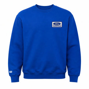 A royal blue crewneck sweatshirt featuring a white and blue Ford Racing logo patch on the left chest, displayed against a solid white background.