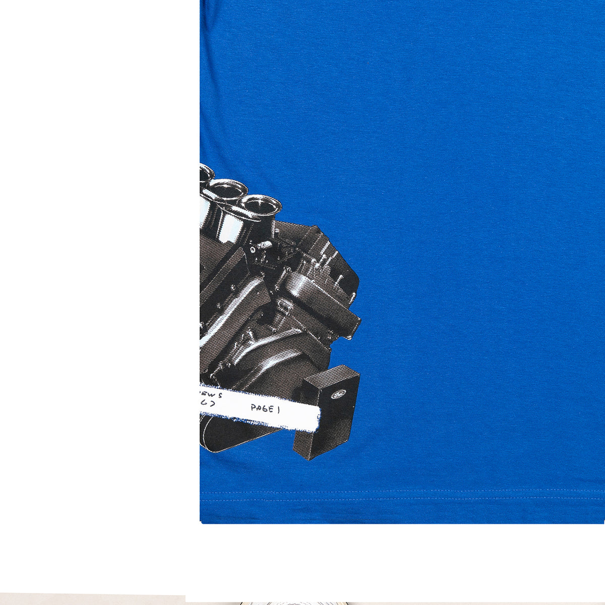A close-up of a bright blue T-shirt with a partial black-and-white engine graphic printed on the chest, shown against a white background.