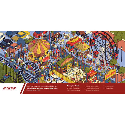 A rectangular illustrated poster or print showing a busy fairground scene with a Ferris wheel, carnival booths, cars, and many small people. The bottom has a dark red banner with the text 'AT THE FAIR' and additional smaller text including 'Can you Pict?'.