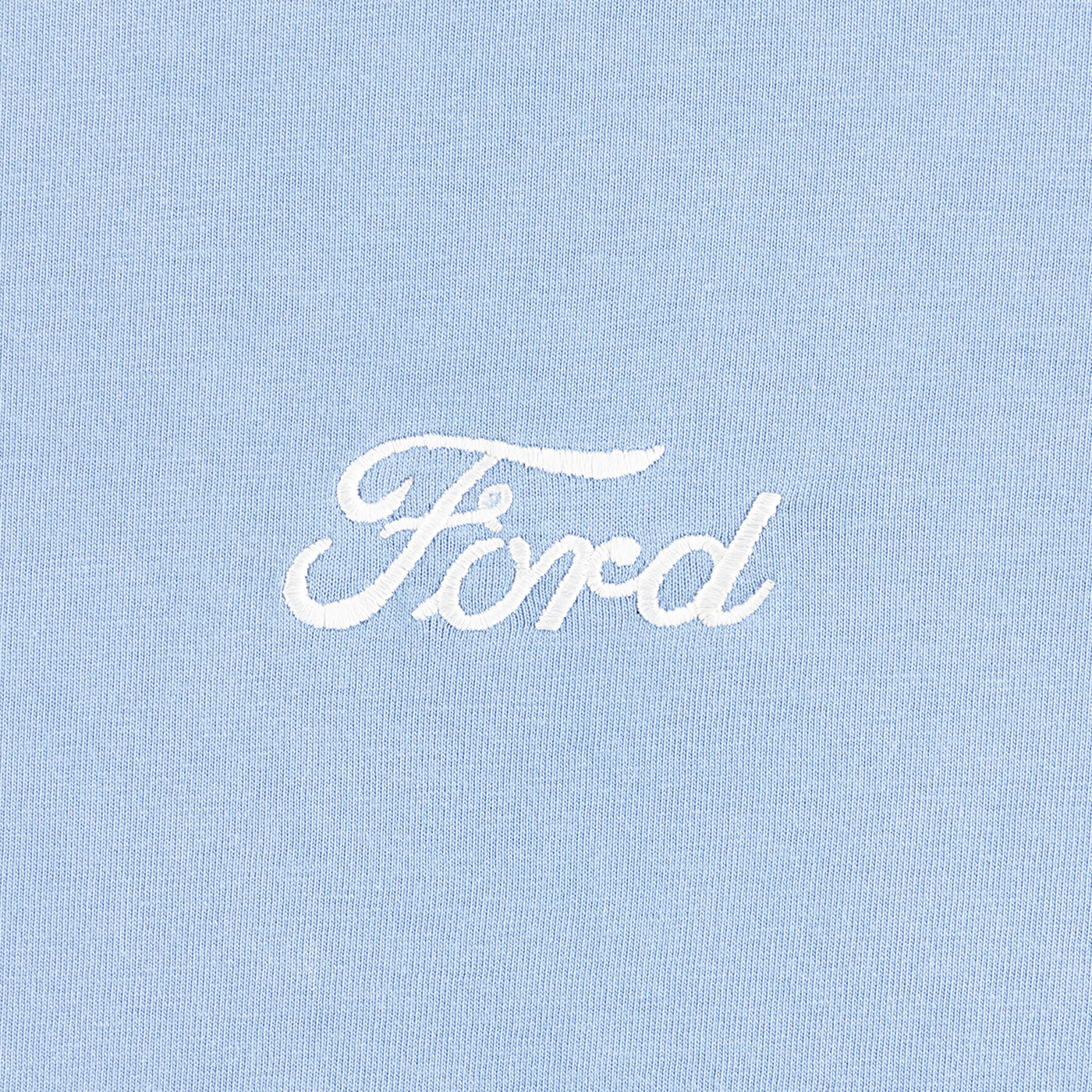 White 'Ford' logo on a light blue background