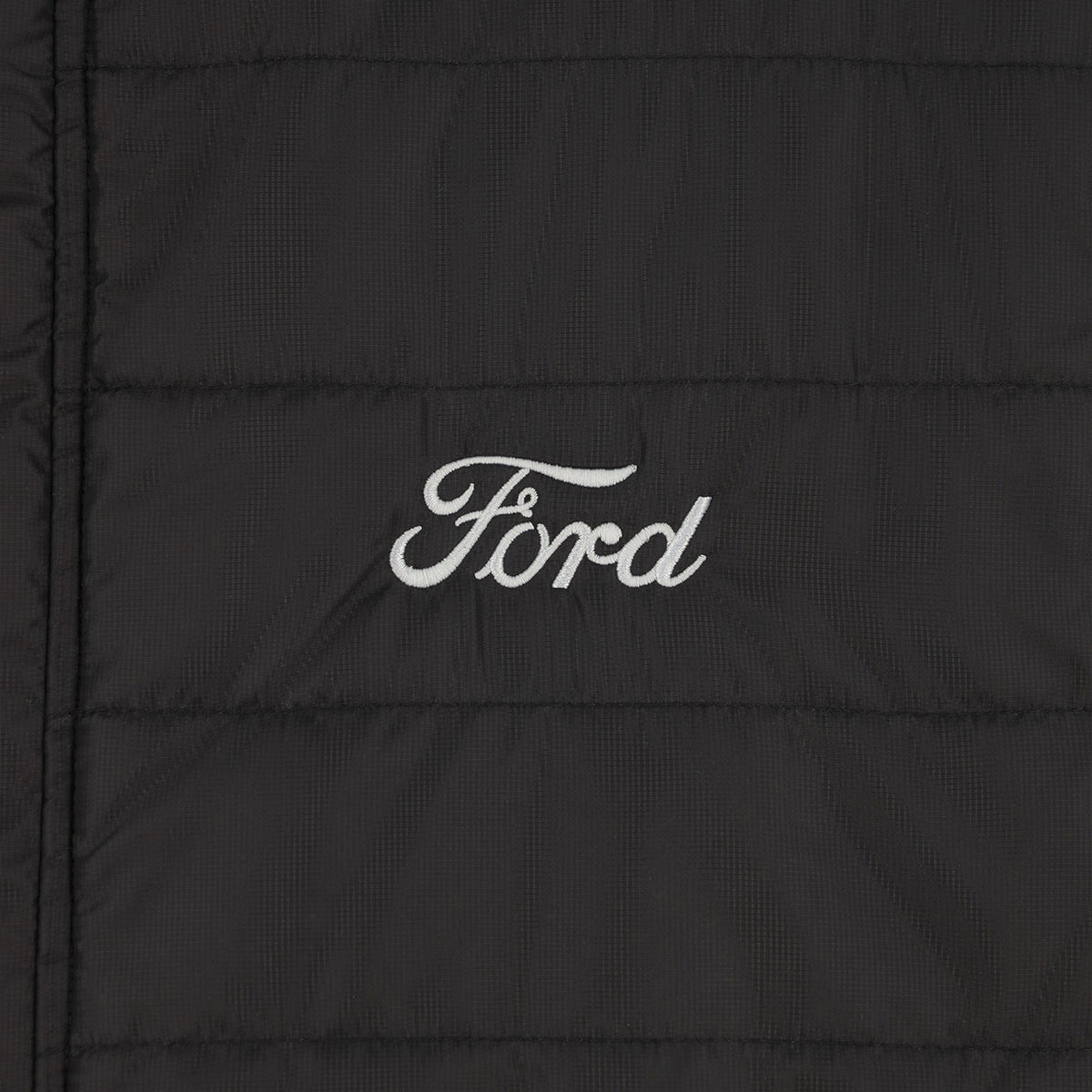 Black jacket with 'Ford' logo on a close-up view