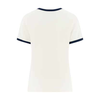 White t-shirt with navy trim on a white background