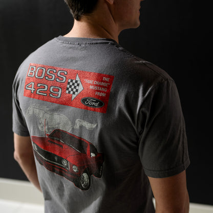 Person wearing a t-shirt with a graphic design on the back, featuring the text 'BOSS 429' and a car illustration.